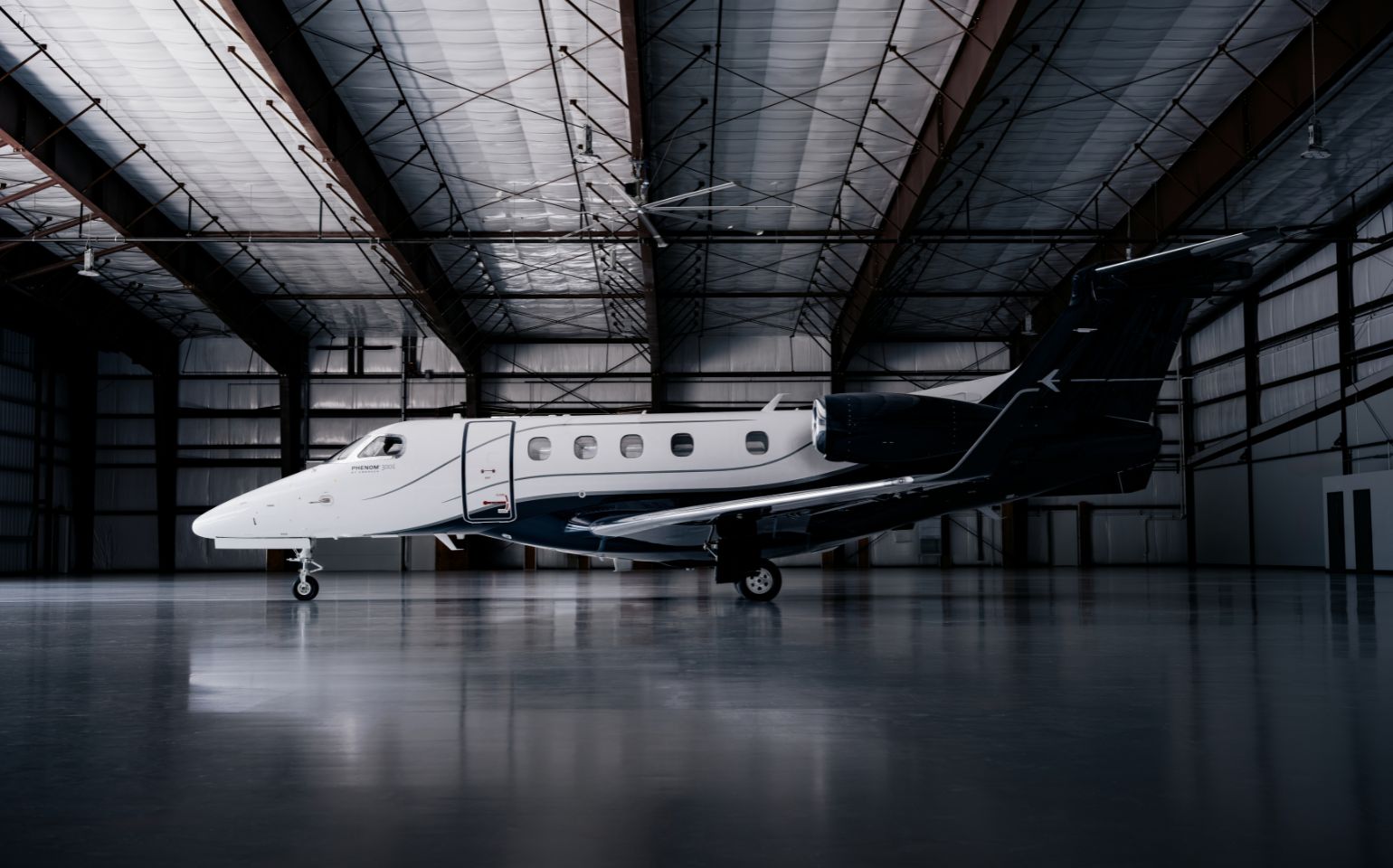 Embraer Phenom 300E in hanger 